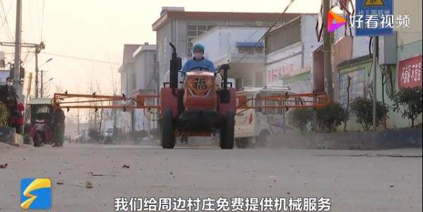 郯城种粮大户发动农机手免费为周边村庄提供机械化消毒